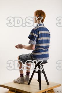 Sitting reference of whole body striped blue gray shirt blue…